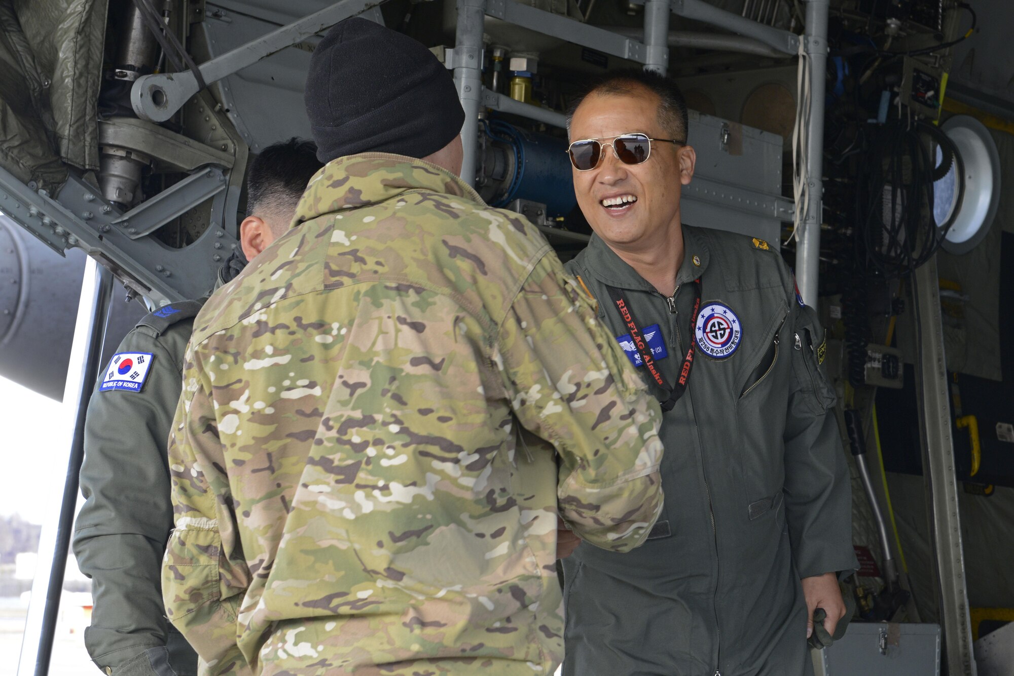 Airmen from the Republic of Korea Air Force speak with Soldiers from the 4th Infantry Brigade Combat Team (Airborne), 25th Infantry Division, U.S. Army Alaska, to prepare for a jump during Red Flag Alaska 17-1 at Joint Base Elmendorf-Richardson, Alaska, Oct. 19, 2016. Red-Flag Alaska 17-1 provides joint offensive counter-air, interdiction, close air support, and large force employment training in a simulated combat environment.

