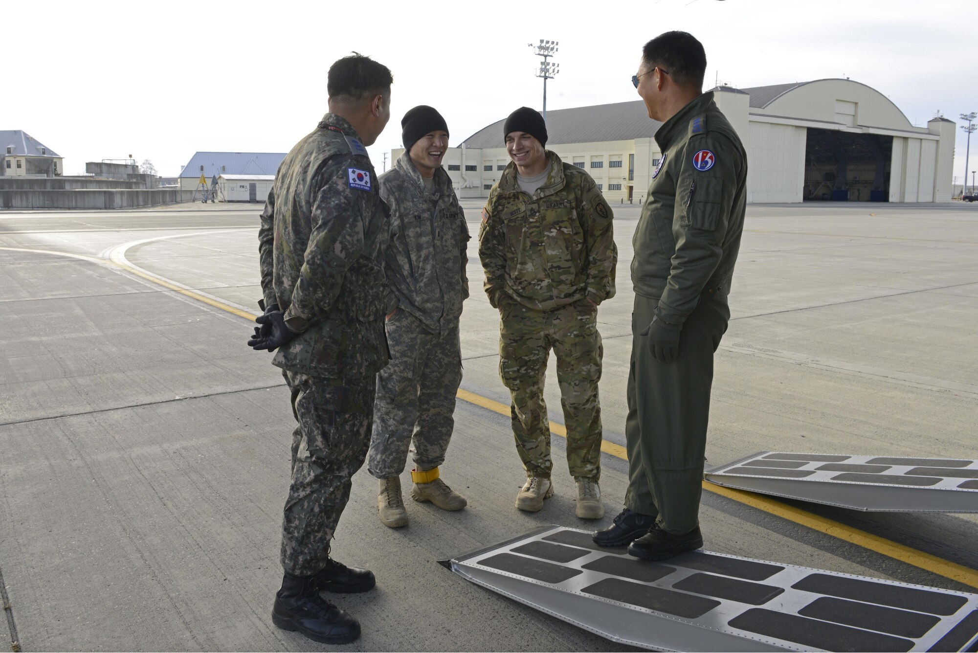 Airmen from the Republic of Korea Air Force speak with Soldiers from the 4th Infantry Brigade Combat Team (Airborne), 25th Infantry Division, U.S. Army Alaska, to prepare for a jump during Red Flag Alaska 17-1 at Joint Base Elmendorf-Richardson, Alaska, Oct. 19, 2016. Red-Flag Alaska 17-1 provides joint offensive counter-air, interdiction, close air support, and large force employment training in a simulated combat environment. 

