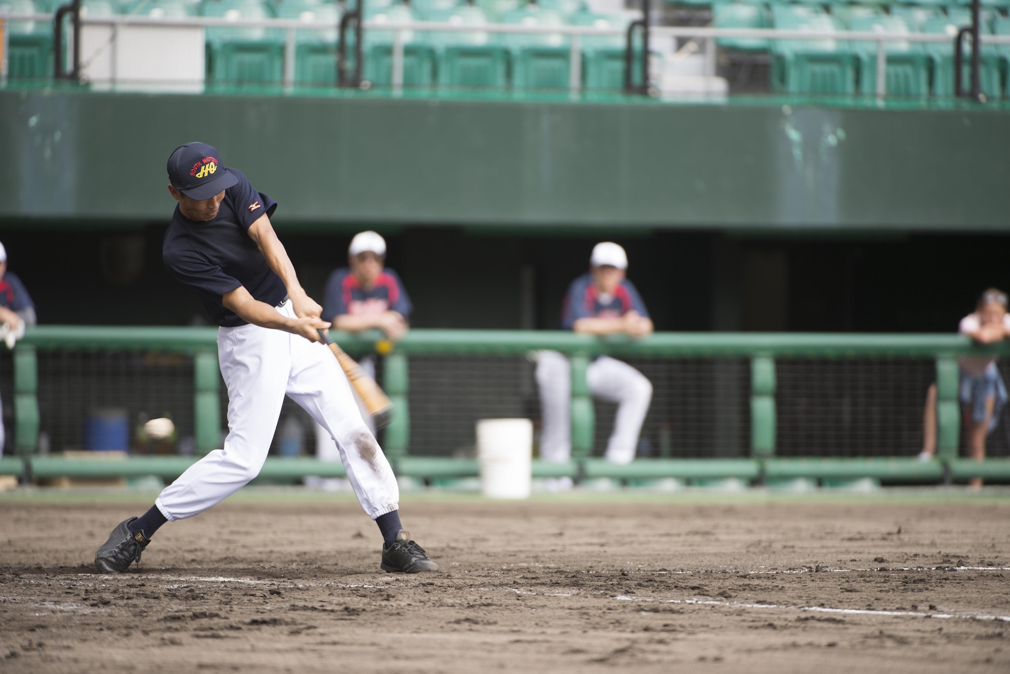 A Japan Air Self-Defense Force Southwest Composite Air Division member takes a strike during a during a baseball game Oct. 15, 2016, at the Cellular Stadium in Naha, Japan. The SWCAD defeated the Allstars 14-7. The baseball game built partnership and friendships between the JASDF, U.S. Consulate and U.S. service members stationed on Okinawa. (U.S. Air Force photo by Senior Airman Omari Bernard)