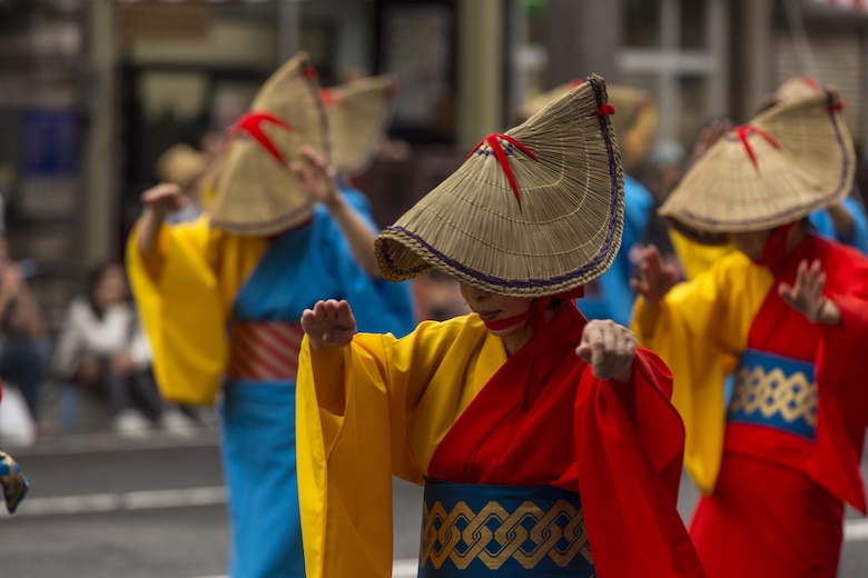 Japanese civilians perform dances during the 60th Annual Iwakuni Festival in Iwakuni City, Japan, Oct. 16, 2016. The festival, hosted by the Iwakuni Festival Committee, consisted of 83 different organizations and approximately 800 people, making it one of the three largest festivals in Iwakuni. The goal of the festival is to enrich the Iwakuni image, show the development of the community and build relationships between Iwakuni civilians. (U.S. Marine Corps photo by Lance Cpl. Aaron Henson)