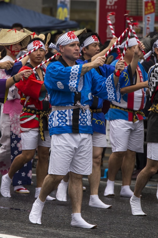 U.S. Marine Corps Sgt. Maj. Christopher J. Garza, sergeant major of Marine Corps Air Station Iwakuni, marches in the 60th Annual Iwakuni Festival in Iwakuni City, Japan, Oct. 16, 2016. The festival, hosted by the Iwakuni Festival Committee, consisted of 83 different organizations and approximately 800 people, making it one of the three largest festivals in Iwakuni. (U.S. Marine Corps photo by Lance Cpl. Aaron Henson)