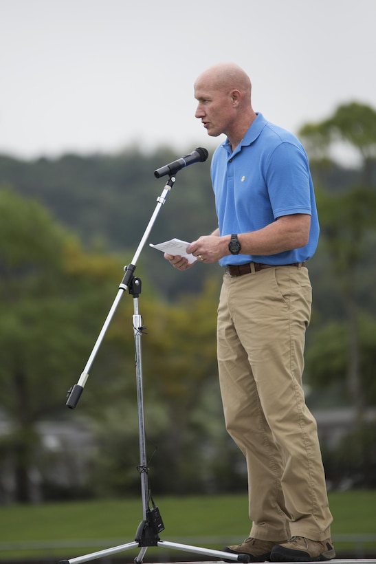 Col. Richard F. Fuerst, station commanding officer for Marine Corps Air Station Iwakuni, addresses station residents and Japanese locals during the U.S-Japan Children Soccer event at the Suo-Oshima Athletic Field in Suo-Oshima, Japan, Oct. 1, 2016. As part of a good keeping with the U.S.-Japan relationship, soccer was used to break the barrier of communication through words and teach children communication through actions. (U.S. Marine Corps photo by Lance Cpl. Joseph Abrego)