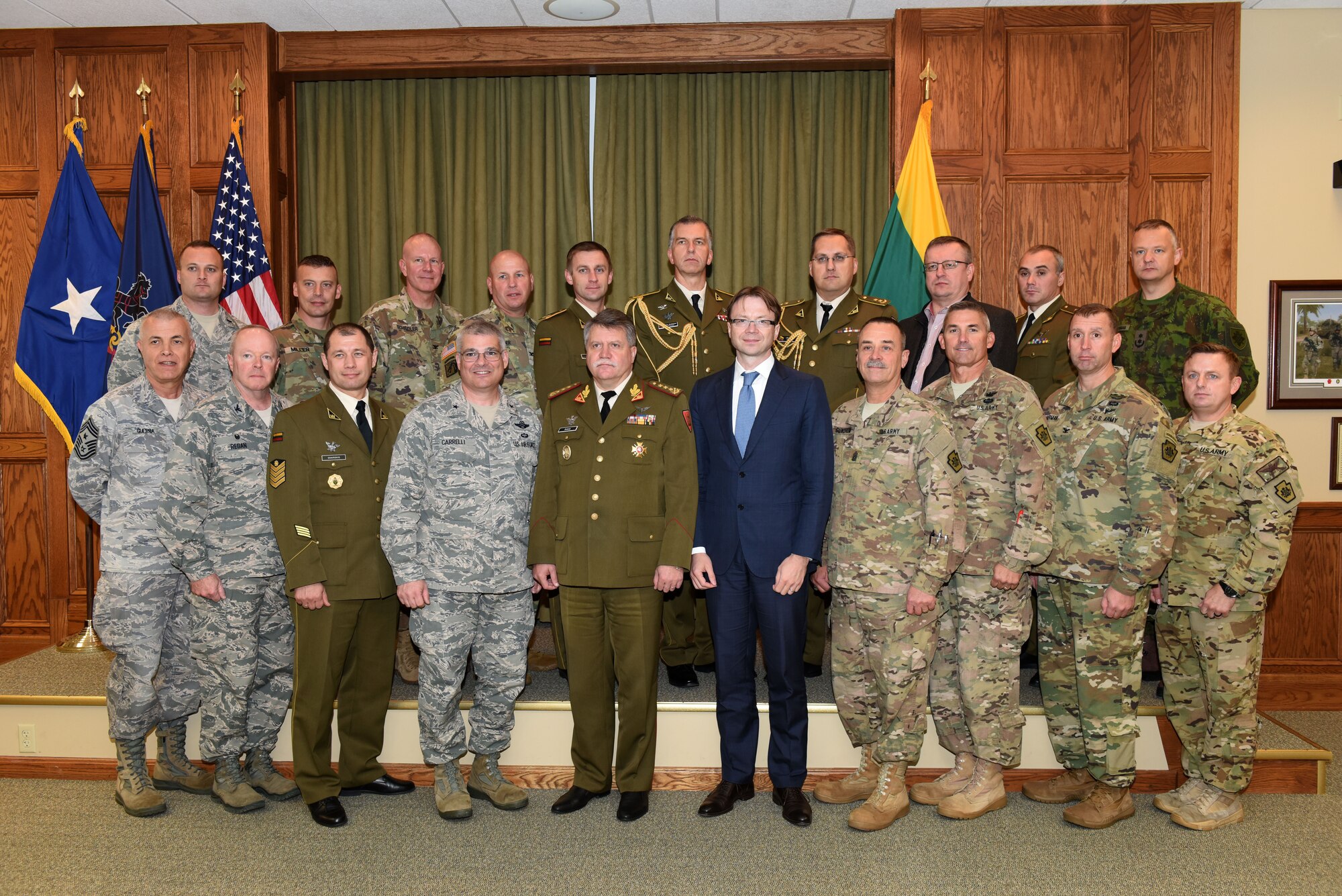 Brig. Gen. Tony Carrelli (front row, fourth from left), adjutant general, Pennsylvania National Guard, and Lt. Gen. Jonas Vytautas Zukas (front row, fifth from left), chief of defense of Lithuania, along with Lithuanian Ambassador Rolandas Krisciunas (front row, sixth from left) and other Lithuanian officials and members of the PANG, met Oct. 15 at the joint force headquarters, Fort Indiantown Gap, Annville, Pa., in an effort to continue fostering a state-country partnership that began in 1993. The day’s events commenced with a meeting between Carrelli and Vytautas Zukas and their respective staffs. While on post, the distinguished guests received tours of the PANG joint emergency operations center and various training facilities. They also got an in-depth look at the PANG’s unmanned aerial vehicle fleet and Advanced Joint Terminal Attack Controller Training System, which provides realistic battlespace scenarios that prepare Airmen for field missions. (U.S. Air National Guard photo by 2nd Lt. Susan Penning/Released)