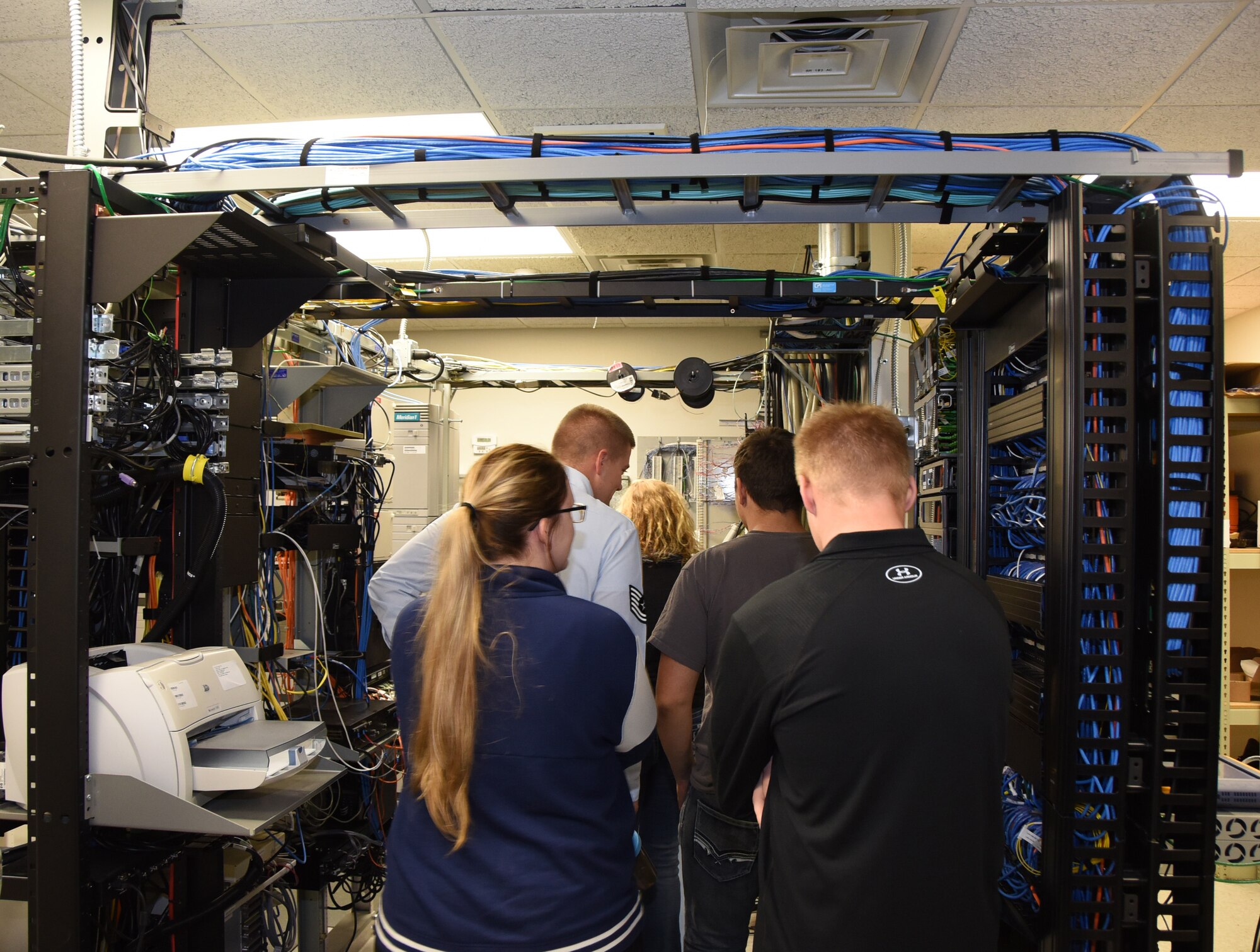 Students tours the 114th Communication Flight during Career Day at Joe Foss Field, S.D. Oct. 19, 2016. Career day showcases different vocations which the Airmen of the 114 FW perform on a daily basis and allows recruiters to share the many benefits the Air National Guard has to offer it's members. (U.S. Air National Guard photo by Staff Sgt. Duane Duimstra/Released)  