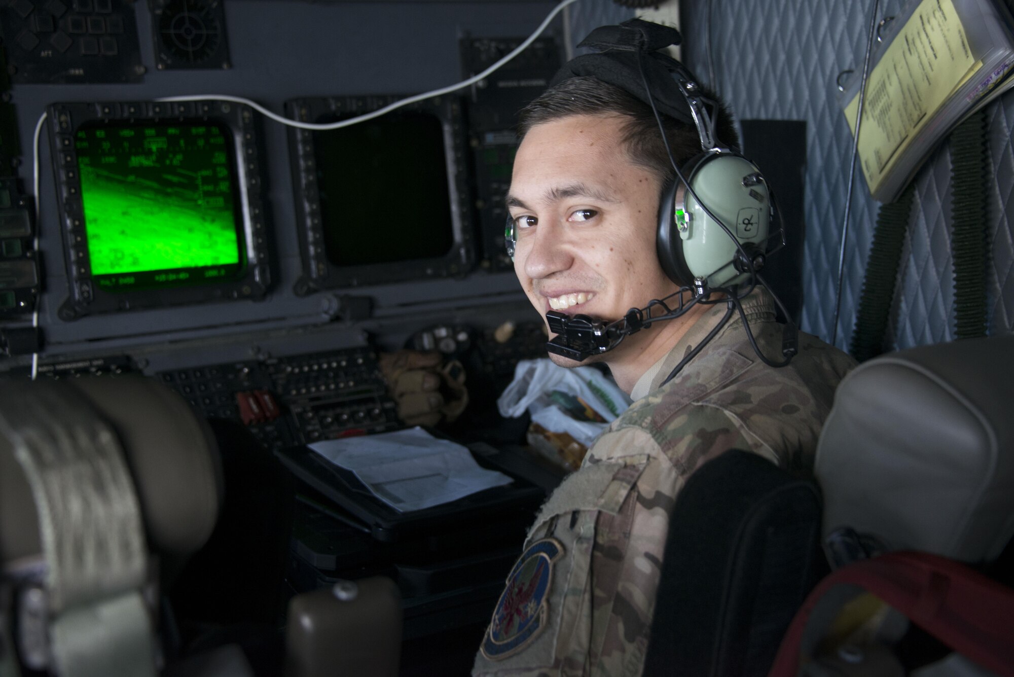 Capt. Stephen Chauvin, 1st Special Operations Squadron electronic warfare officer verifies jump data for high-altitude, low-opening (HALO) airdrop. Air Commandos from the 353rd Special Operations Group supported HALO airdrops into Crow Valley in Tarlac Province, Philippines with joint and combined partners during Teak Piston 2016. (U.S. Air Force photo by Capt. Jessica Tait)