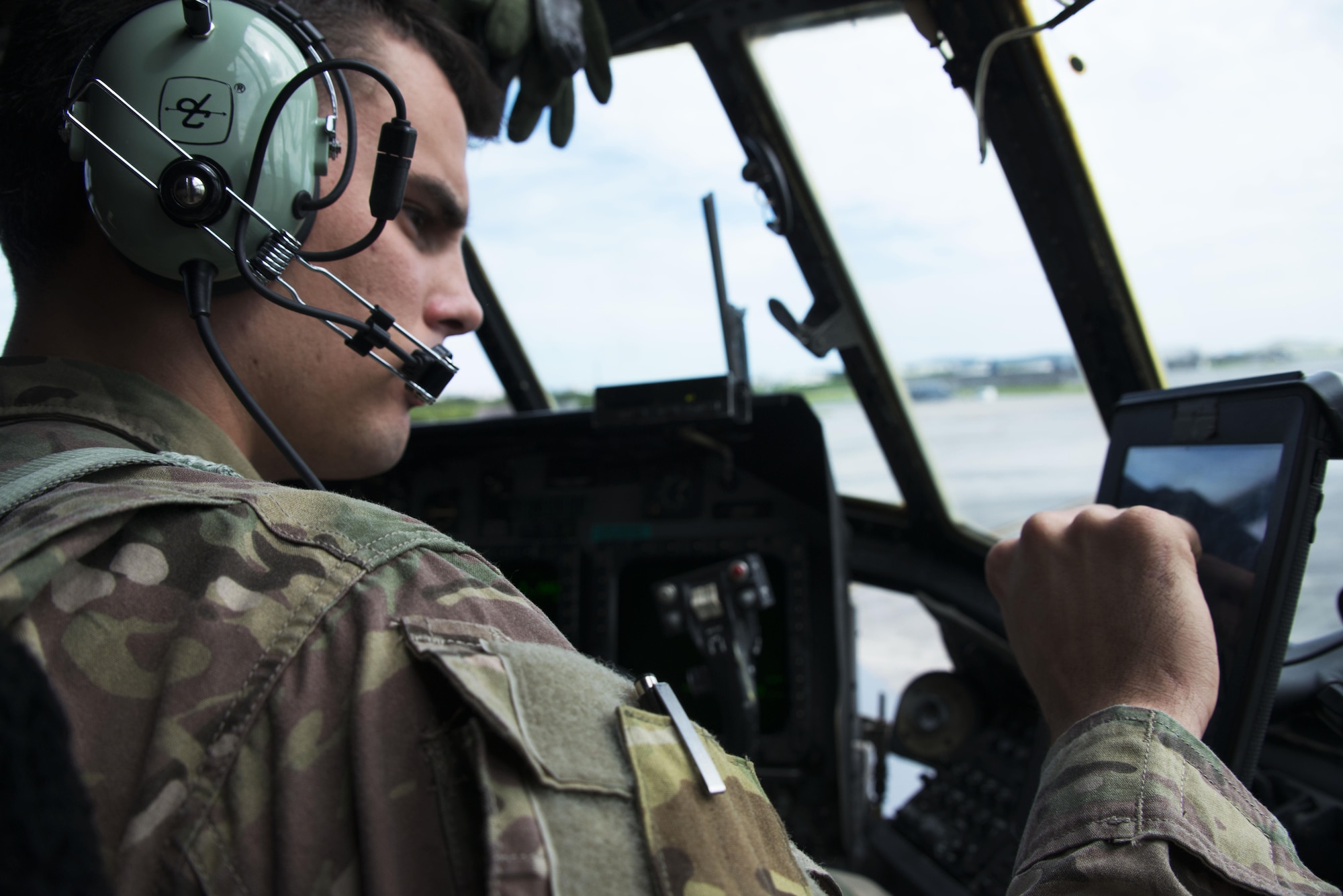 Capt. Steven Conradi, 1st Special Operations Squadron co-pilot prepares a MC-130H Combat Talon II for take-off at Kadena Air Base, Sept. 22. The crew transported equipment and personnel to Clark Air Base and Mactan-Benito Ebuen Air Base for Teak Piston 2016, a joint-combined exchange training (JCET) conducted with several units from the Philippine Air Force. (U.S. Air Force photo by Capt. Jessica Tait)