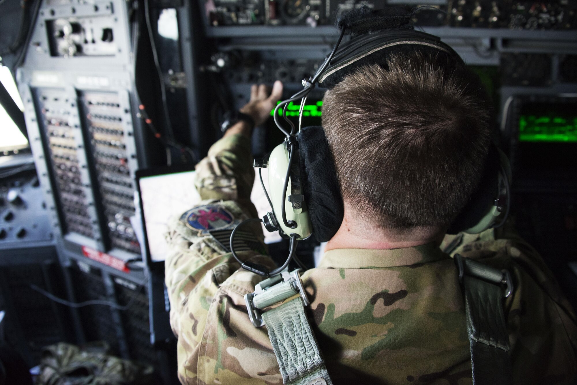 Capt. Jonathan Parks, 1st Special Operations Squadron navigator directs low-level airdrops. Air commandos from the 1st Special Operations Squadron support high-altitude, low-opening airdrops during Teak Piston 2016. Though the HALO airdrop was not an official part of Teak Piston 2016, the presence of a MC-130H in the Philippines allowed for a unique training engagement. (U.S. Air Force photo by Capt. Jessica Tait)