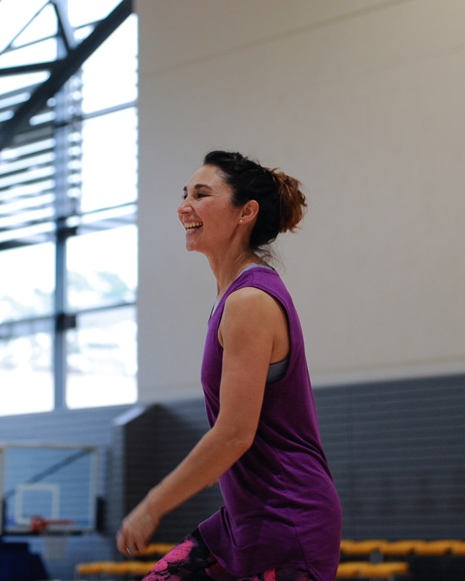 Melissa Garcia, 86th Medical Operations Squadron Family Advocacy Program outreach manager, dances during a Zumba class held to raise awareness for domestic violence at Ramstein Air Base, Germany, Oct. 14, 2016. Several activities have taken place this month in support of domestic violence awareness, and will include a Sexual Assault Resource Center candlelight vigil on Oct. 27. (U.S. Air Force photo by Airman 1st Class Savannah L. Waters)