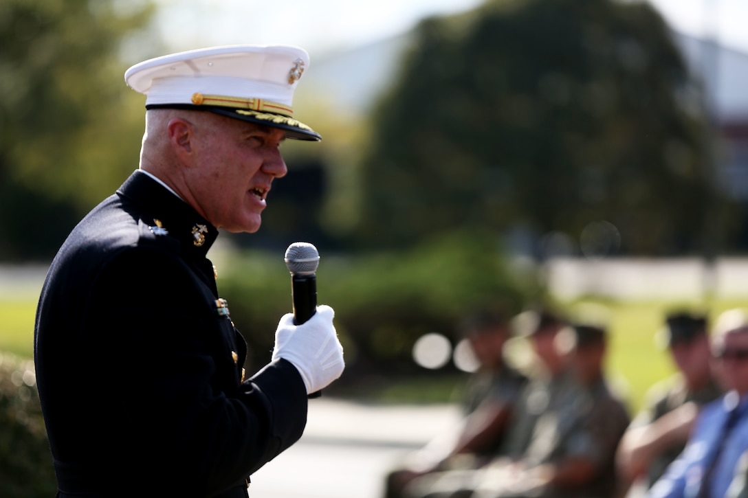 Retired Maj. Gen. Charles L. Hudson, speaks to guests and family members during Col. Yori R. Escalante’s, deputy commander of Marine Corps Installation East - Marine Corps Base Camp Lejeune, retirement ceremony Marine Corps Base Camp Lejeune, Oct. 14. Col. Yori R. Escalante retired today after 30 years of faithful and dedicated service to the Marine Corps. (U.S. Marine Corps photo by Pfc. Juan Madrigal/Released)