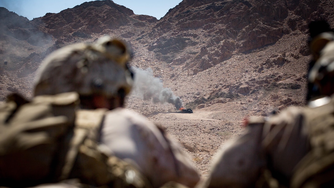 U.S. Marines with weapons platoon, Company F, 2nd Battalion, 7th Marine Regiment, Special Purpose Marine Air - Ground Task Force - Crisis Response - Central Command, conduct a live - fire range during Mission Rehearsal Exercise 2016 near the southern border of the Hashemite Kingdom of Jordan,  Sept. 11, 2016. The MRX is a collective training event where the MAGTF elements collaborate to refine individual and cooperative capabilities. SPMAGTF - CR – CC is a self-sustaining expeditionary unit, designed to provide a broad range of crisis response capabilities throughout the Central Command area of responsibility, using organic aviation, logistical, and ground combat assets, to include embassy reinforcement and tactical recovery of aircraft and personnel. 