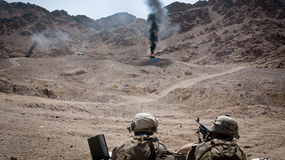 U.S. Marines with weapons platoon, Company F, 2nd Battalion, 7th Marine Regiment, Special Purpose Marine Air - Ground Task Force - Crisis Response - Central Command, engage multiple targets while conducting a live - fire range during Mission Rehearsal Exercise 2016 near the southern border of the Hashemite Kingdom of Jordan,  Sept. 11, 2016. The MRX is a collective training event where the MAGTF elements collaborate to refine individual and cooperative capabilities. SPMAGTF - CR – CC is a self-sustaining expeditionary unit, designed to provide a broad range of crisis response capabilities throughout the Central Command area of responsibility, using organic aviation, logistical, and ground combat assets, to include embassy reinforcement and tactical recovery of aircraft and personnel. 