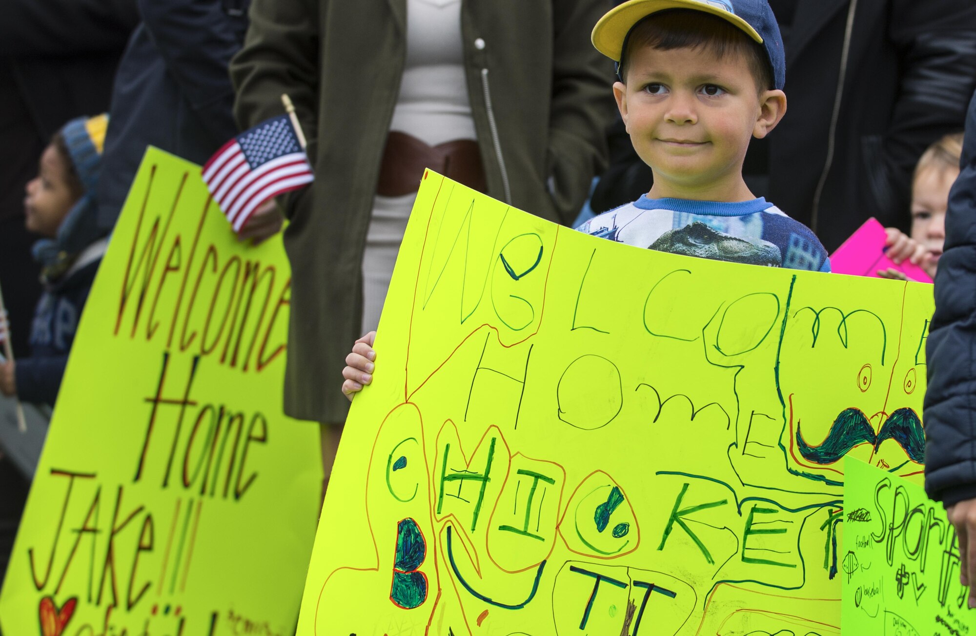 A child awaits greeting his father during the 606th Air Control Squadron’s return to Spangdahlem Air Base, Germany, Oct. 20, 2016. Nearly 200 Airmen assigned to the 606th Air Control Squadron returned from a six-month rotational deployment to Southwest Asia in support of Operations Freedom’s Sentinel and Inherent Resolve. (U.S. Air Force photo by Senior Airman Dawn M. Weber)