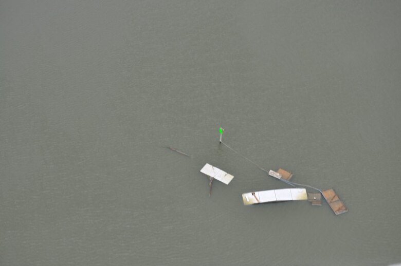 Debris is tangled around a navigation aid near Thunderbolt. 