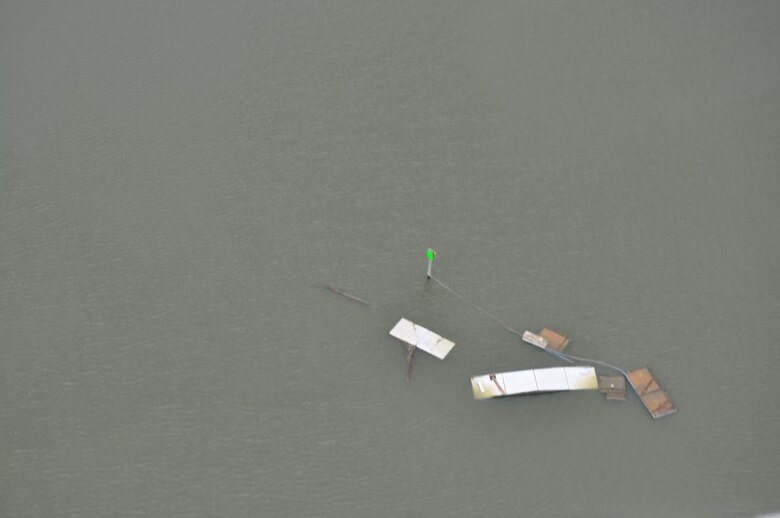 Debris is tangled around a navigation aid near Thunderbolt. 