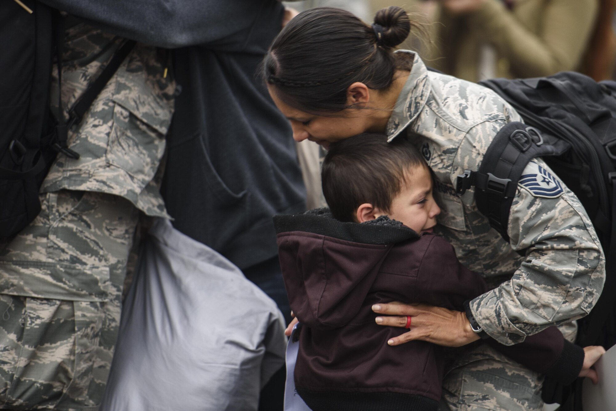 Airmen assigned to the 606th Air Control Squadron reunite with their family during the squadron’s return from deployment to Spangdahlem Air Base, Germany, Oct. 20, 2016. The squadron's Airmen deployed to Southwest Asia in support of Operations Freedom’s Sentinel and Inherent Resolve. (U.S. Air Force photo by Staff Sgt. Jonathan Snyder)
