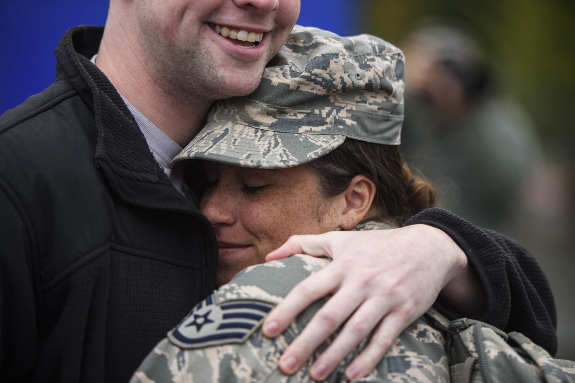 An Airman assigned to the 606th Air Control Squadron reunites with her loved one during the squadron’s return from deployment to Spangdahlem Air Base, Germany, Oct.  20, 2016. The squadron's Airmen deployed to Southwest Asia in support of Operations Freedom’s Sentinel and Inherent Resolve. (U.S. Air Force photo by Staff Sgt. Jonathan Snyder)
