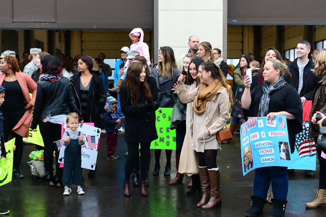 Military families and friends wait for the 606th Air Control Squadron to return to Spangdahlem Air Base, Germany, Oct. 20, 2016. Nearly 200 Airmen assigned to the 606th ACS returned, from a six-month rotational deployment to Southwest Asia in support of Operations Freedom’s Sentinel and Inherent Resolve. (U.S. Air Force photo by Senior Airman Joshua R. M. Dewberry)