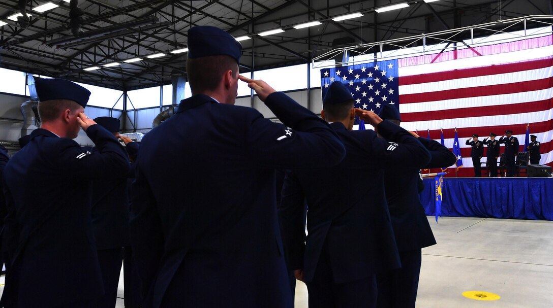 Ramstein Airmen render a salute during the 3rd Air Force change of command at Ramstein Air Base, Germany, Oct. 21, 2016. Members of the 3rd Air Force bade farewell to Lt. Gen. Ray as they welcomed Lt. Gen. Richard M. Clark. (U.S. Air Force photo by Senior Airman Tryphena Mayhugh)