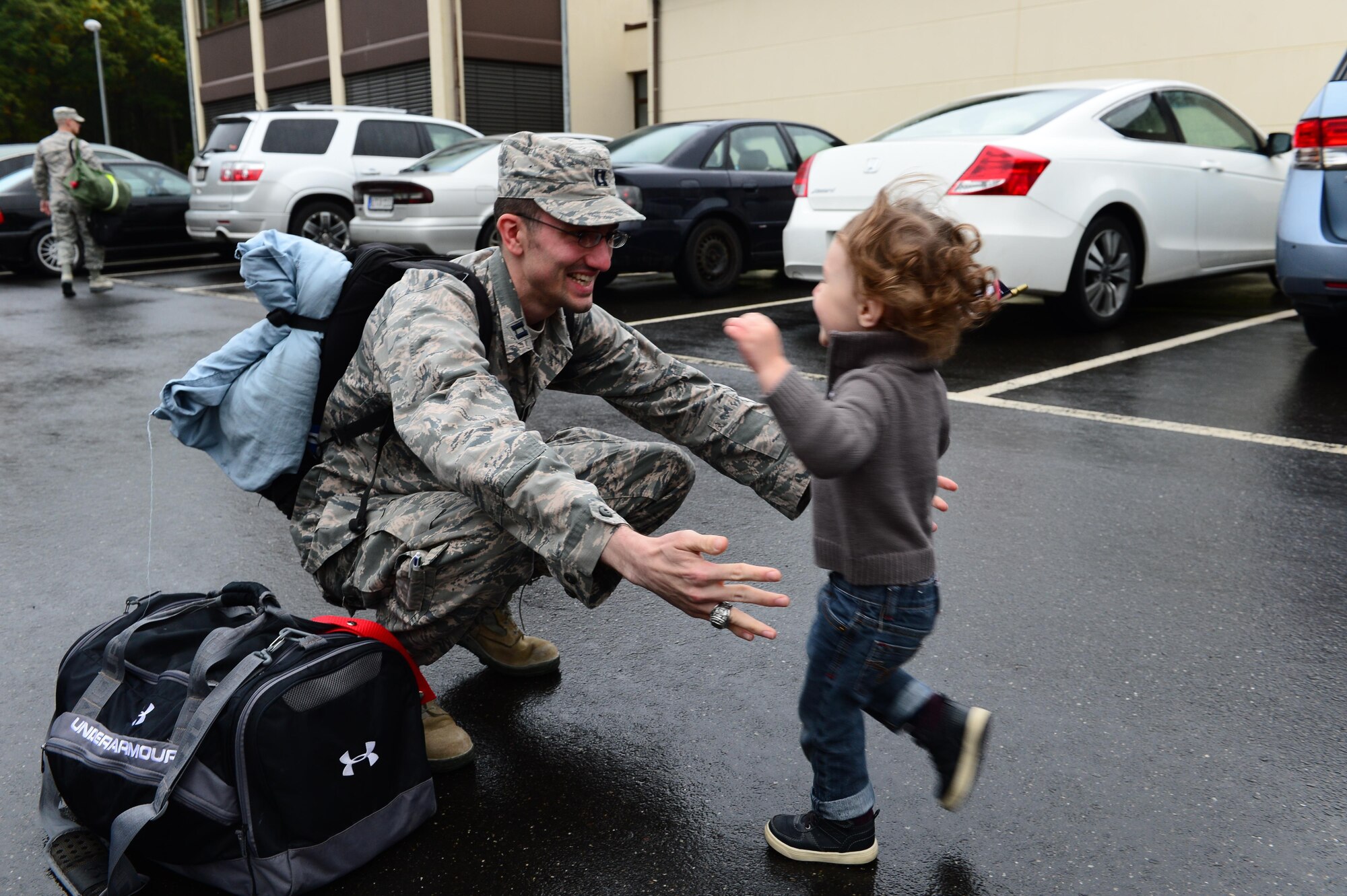 An Airman assigned to the 606th Air Control Squadron embraces his son after his return to Spangdahlem Air Base, Germany, Oct. 20, 2016, from a six-month rotational deployment to Southwest Asia in support of Operations Freedom’s Sentinel and Inherent Resolve. The 606th ACS is a self-sustaining squadron consisting of maintenance, supply and approximately 21 other Air Force specialties. (U.S. Air Force photo by Senior Airman Joshua R. M. Dewberry)