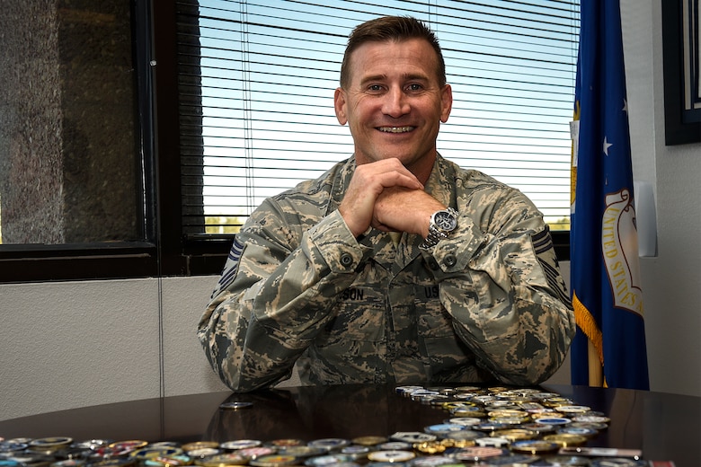 PETERSON AIR FORCE BASE, Colo. – Chief Master Sgt. Mark Bronson, 21st Space Wing command chief, assumed his new position Sept. 11, 2016, at Peterson Air Force Base, Colo. As the voice of the Airmen at Peterson, Bronson works closely with the wing commander to ensure any needs or concerns are met. (U.S. Air Force photo by Senior Airman Rose Gudex)