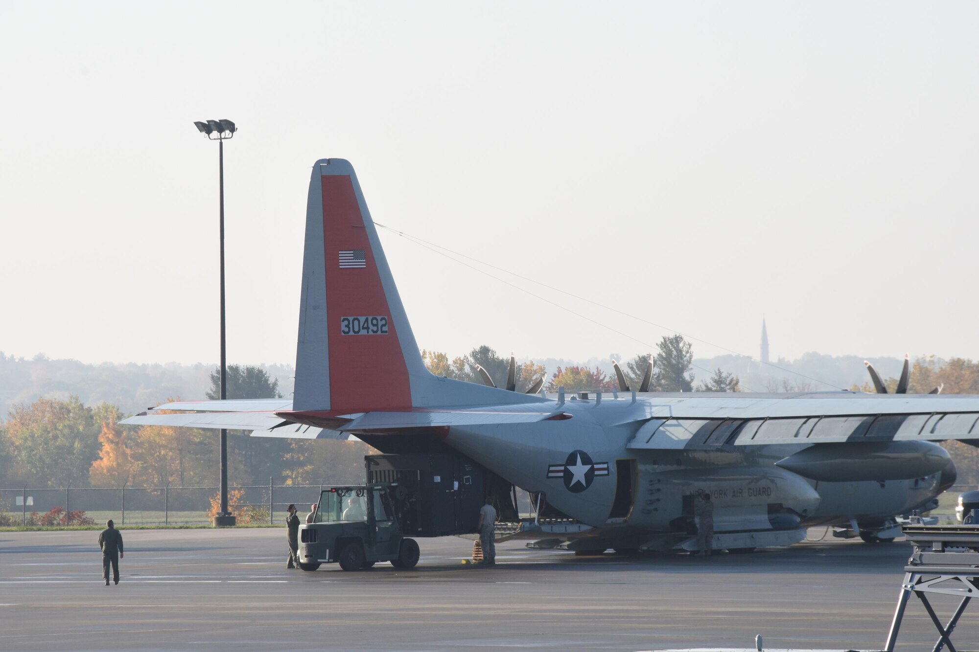 Airmen load cargo onto an LC-130 "Skibird" with the New York Air National Guard's 109th Airlift Wing on Oct. 18, 2016, shortly before it departed for McMurdo Station, Antarctica. This is the 29th season that the unit will participate in Operation Deep Freeze, the military component of the U.S. Antarctic Program, which is managed by the National Science Foundation. (U.S. Air National Guard photo by Master Sgt. William Gizara/Released)