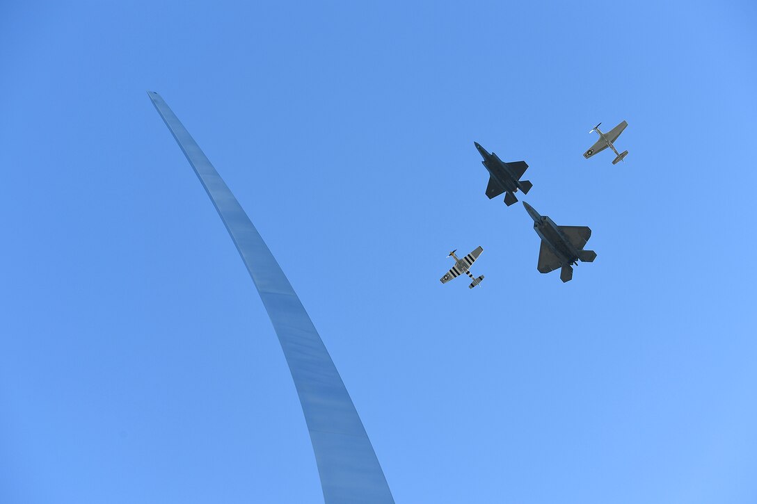 A four-ship formation performs a flyover during the Air Force Memorial's 10th anniversary ceremony in Arlington, Va., Oct. 14, 2016. The flyover consisted of several different airframes representing the heritage of the Air Force. (U.S. Air Force photo/Scott M. Ash)