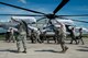 Members of the 621st Contingency Response Wing load humanitarian aid onto a Marine Corps CH-35E Super Stallion in Port-au-Prince, Haiti, Oct. 16, 2016. The 621st CRW has units ready to deploy anywhere in the world within 12 hours of notification in support of emergency operations. (U.S. Air Force photo/Staff Sgt. Robert Waggoner)