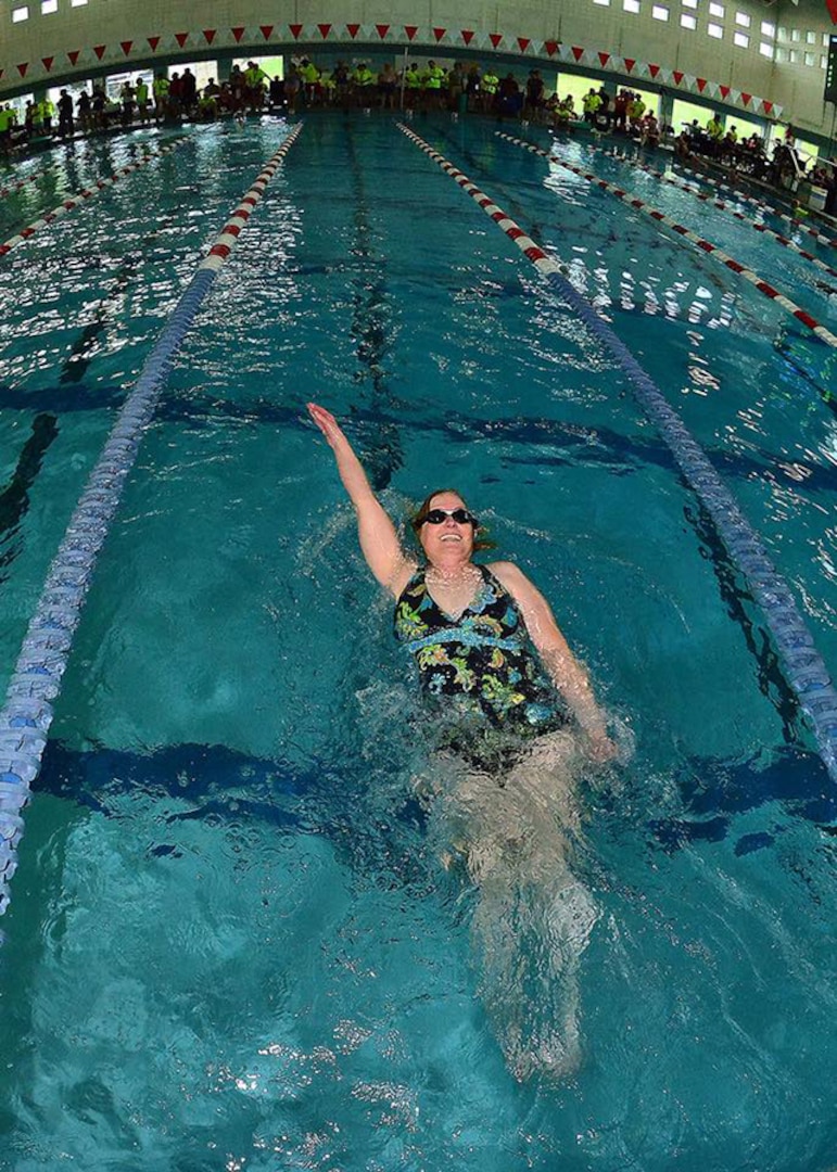 Kathleen Tilbury medals in the 100-meter backstroke during the 2016 National Veterans’ Wheelchair Games June 26 – July 2 in Salt Lake City, Utah. Tilbury is a retired Navy Petty Officer 2nd Class working as a program management/finance analyst Defense Logistics Agency’s Office of Operations Resource and Research Analysis.  