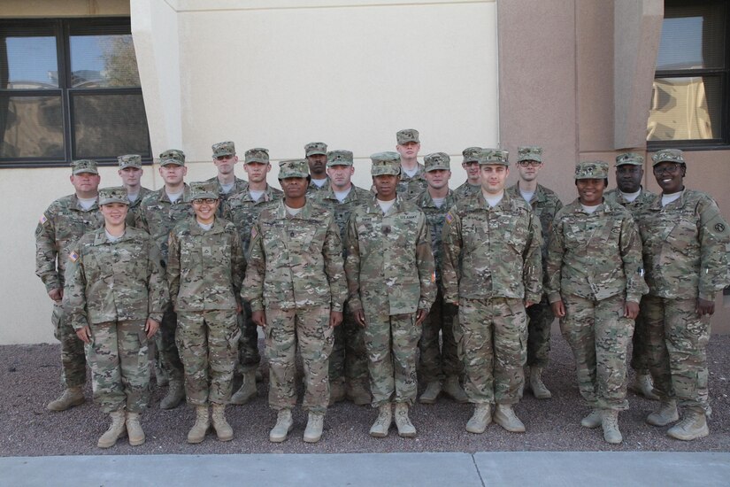 Colonel Paul Hettich, the rear commander of the 451st Expeditionary Sustainment Command, visited the 387th Human Resources detachment and recognized 1st Lieutenant LaShontonna Sipho, platoon leader of the detachment, and Sergeant First Class Telia Phoenix, platoon sergeant of the detachment, for their hard work. “You both have done a great job preparing Soldiers and I know this will be a successful deployment,” said Col. Hettich as he coined both women. This is the first deployment for Sipho and Phoenix who, combined, are the command team for the small postal detachment.