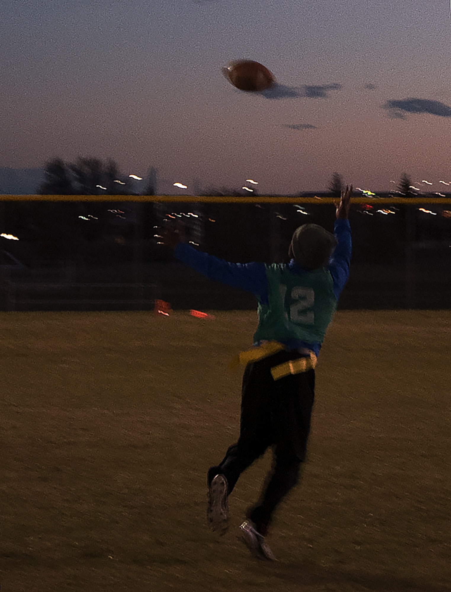 Troy Stuckey, 90th Maintenance Group and 20th Air Force intramural flag football team member, reaches out to catch a pass during the championship game at F.E. Warren Air Force Base, Wyo., Oct. 19, 2016. The 90th MXG/20th AF team beat the 790th Missile Security Forces Squadron Tactical Response Force team 14-6. (U.S. Air Force photo by Senior Airman Brandon Valle)