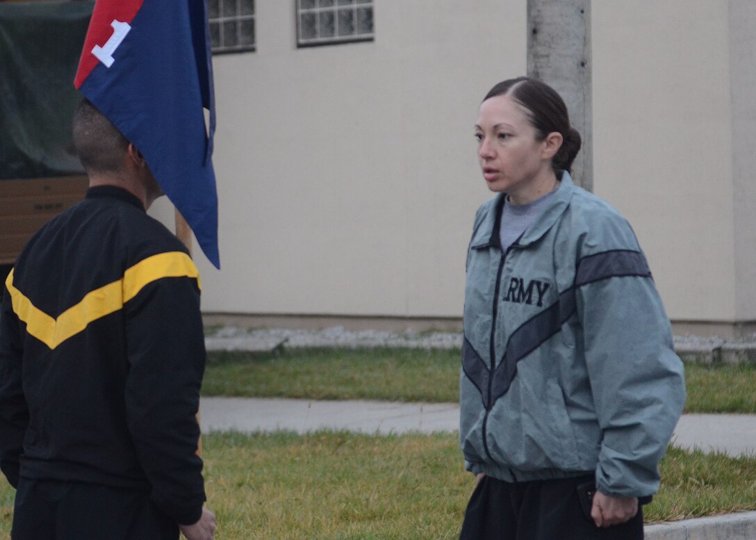 Army 1st Sgt. Gina Aceves, the senior enlisted leader of Headquarters and Headquarters Company, 1st Armored Brigade Combat Team, 1st Infantry Division, leads an accountability formation prior to the start of physical readiness training at Fort Riley, Kansas, Oct. 12, 2016. Aceves joined the Army more than 20 years ago to provide a better life for her family after living in financial hardship most of her life. Army photo by Staff Sgt. Warren W. Wright Jr.