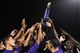 Members of the 509th Security Forces Squadron (SFS) hold up the intramural flag-football championship trophy at Whiteman Air Force Base, Mo., Oct. 17, 2016. The 509th SFS won the championship game by defeating the 509th Aircraft Maintenance Squadron with a final score of 30-16. (U.S. Air Force photo by Senior Airman Joel Pfiester)