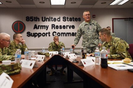 Sgt. Maj. James Rogers, standing, G3/Operations sergeant major for the 85th Support Command, interjects remarks during the New Command Team Orientation brief for First Army brigade commanders, October 16, 2016. The 85th Support Command hosted the briefing to provide situational awareness and understanding of how these active-component commanders’ Army Reserve elements operate.
(Photo by Sgt. Aaron Berogan)