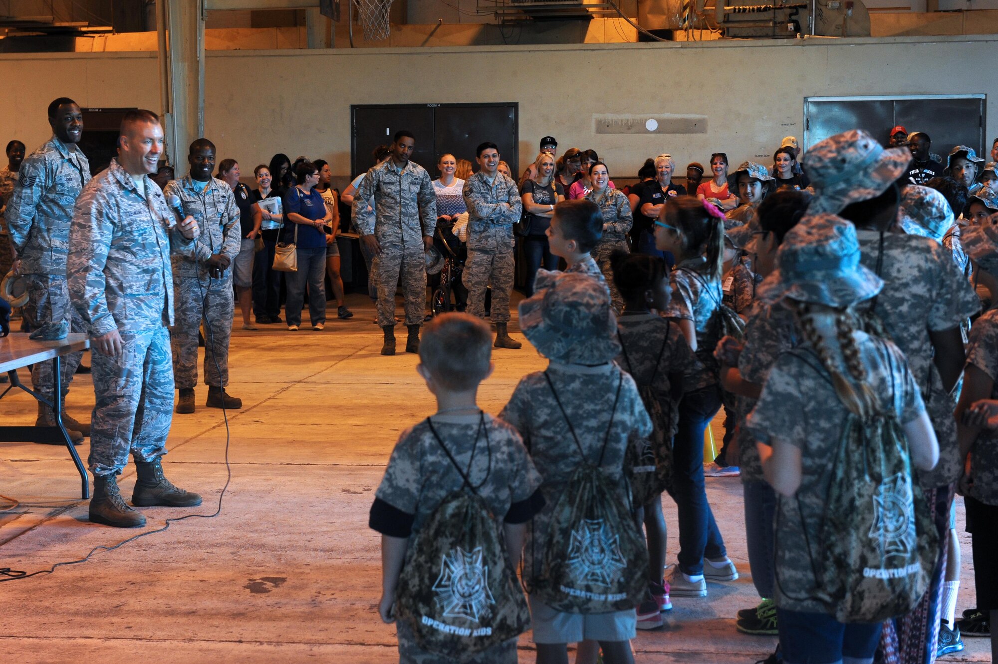 Brig. Gen. Brook Leonard, 56th Fighter Wing commander, gives opening remarks during the Operation Kids event Oct. 15 at Luke Air Force Base, Ariz. The Operations Kids event was held to educate young thunderbolts on the deployment process. (U.S. Air Force Photos by Airman 1st Class Pedro Mota)