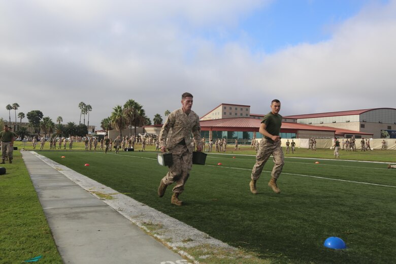 Marines with Marine Aircraft Group (MAG) 39 compete in combat fitness test challenge during the Warrior Games Field Meet at Marine Corps Base Camp Pendleton, Calif., Oct. 15. The Warrior Games consisted of a five-month competition between squadrons within MAG-39, culminating in a field meet, where each squadron competed to win points toward a trophy and grand prize of a 72-hour liberty period.(U.S. Marine Corps photo by Lance Cpl. Jacob Pruitt/Released)