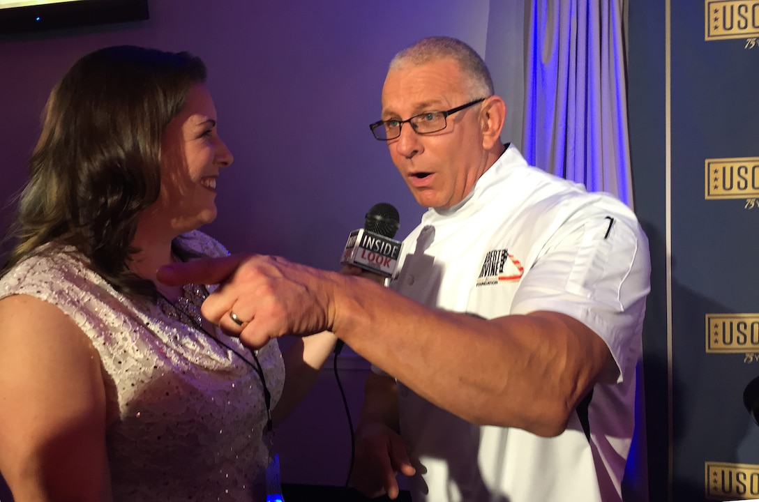 Chef Robert Irvine speaks about his USO experiences during the 75th Anniversary USO Gala at the Daughters of the American Revolution Constitution Hall in Washington, D.C., Oct, 20, 2016. DoD photo by Jim Garamone