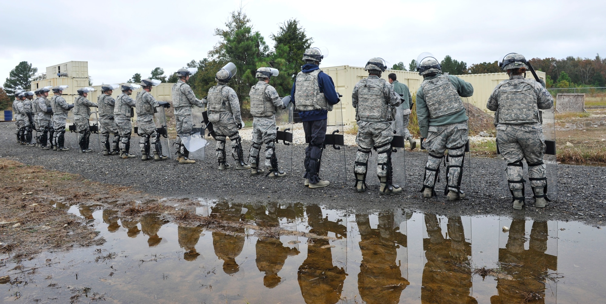 Defenders from the 19th Security Forces Squadron prepare for maximum protection as a unit during riot training Oct. 13, 2016, at Little Rock Air Force Base, Ark. (U.S. Air Force photo by Staff Sgt. Regina Edwards)