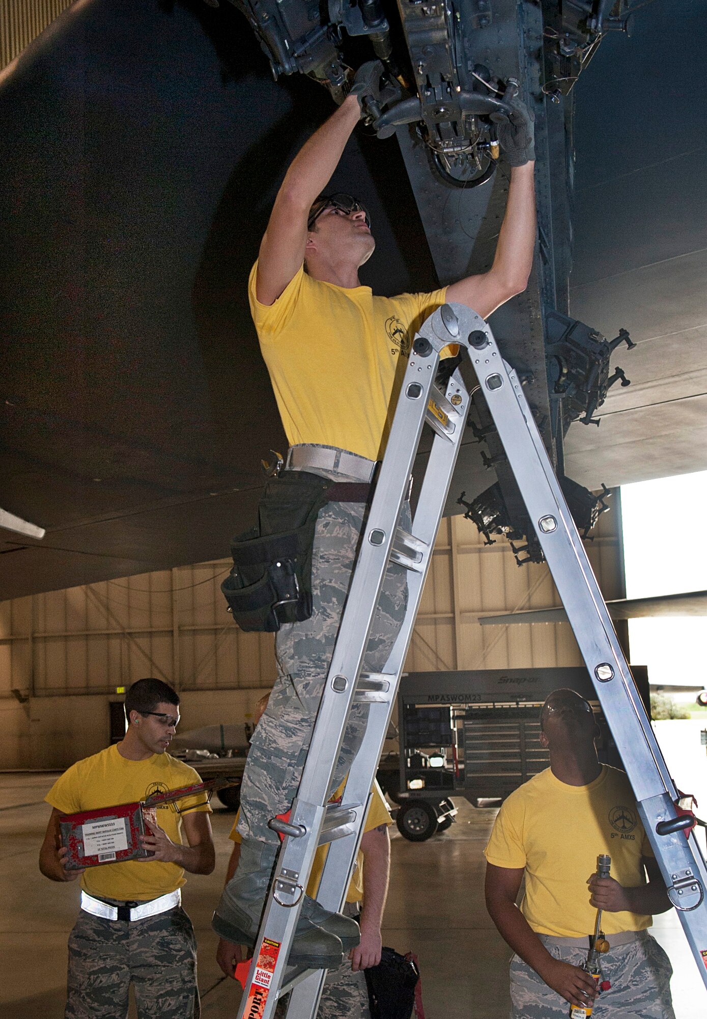Airmen from the 5th Aircraft Maintenance Squadron compete in a quarterly bomb load competition at Minot Air Force Base, N.D., Oct. 14, 2016. The competition evaluated the Airmen in four different categories: dress and appearance, best load, a written test and a consolidated tool kit inspection. (U.S. Air Force photo/Airman 1st Class Jonathan McElderry) 