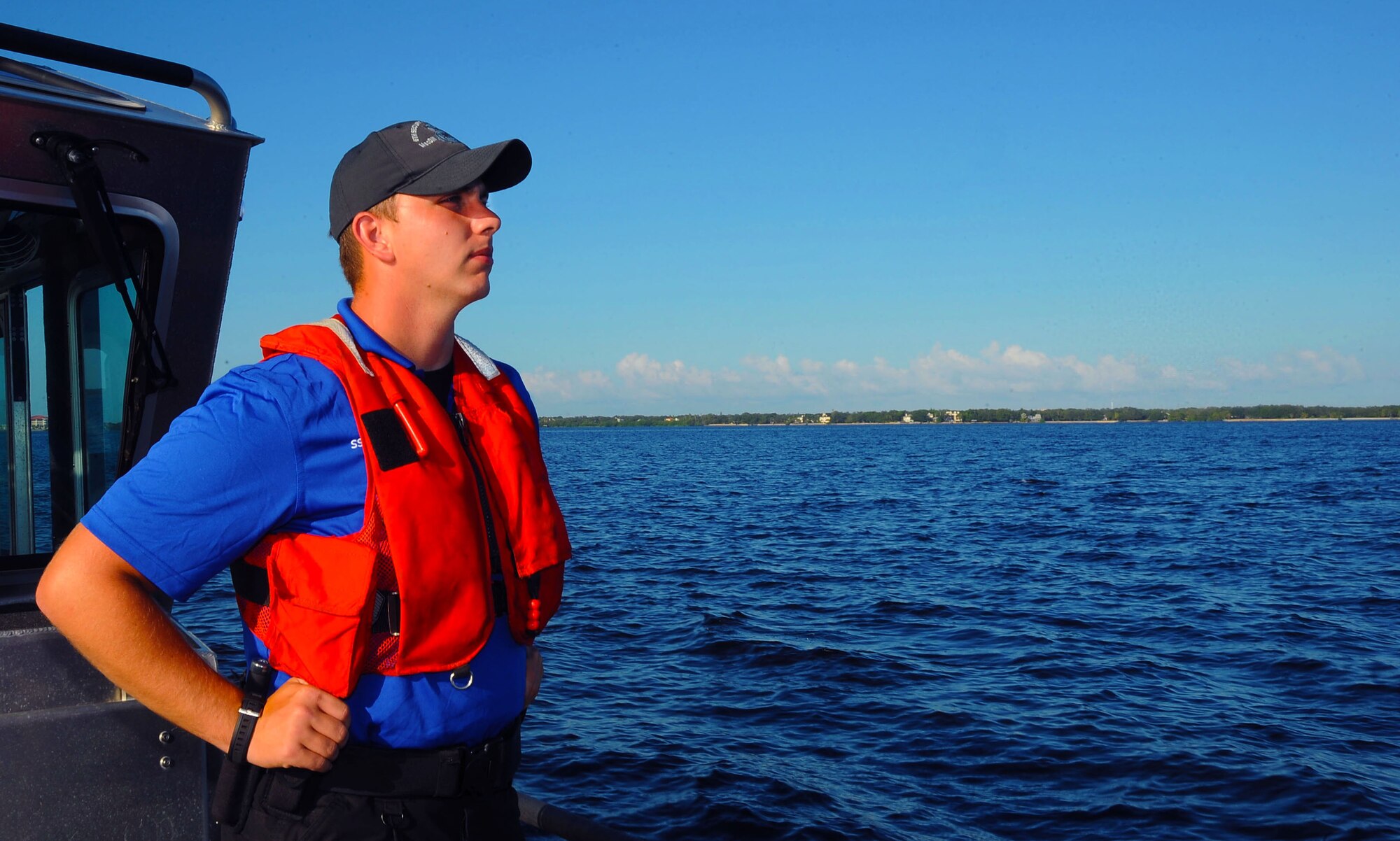 Staff Sgt. Zachary Tierney, a marine patrol crew lead assigned to the 6th Security Forces Squadron, scans the waters around MacDill Air Force Base, Fla., Oct. 21, 2016. Members of marine patrol routinely check the perimeter of MacDill’s coastline for any unauthorized boats. (U.S. Air Force photo by Airman Adam R. Shanks)