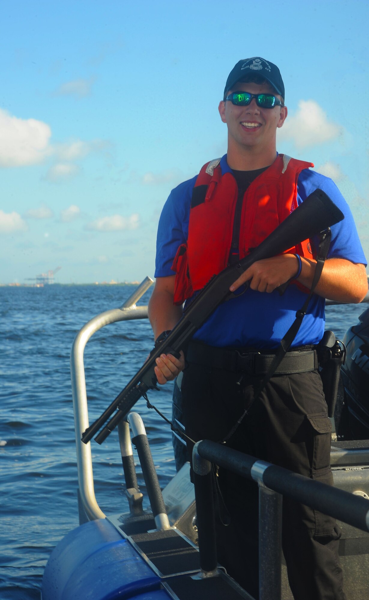 Staff Sgt. Zachary Tierney, a marine patrol crew lead with the 6th Security Forces Squadron, pauses for a photo during a patrol of the waters near MacDill Air Force Base, Fla., Oct. 21, 2016. Tierney, who initially completed marine patrol tryouts July 21, 2016, is now an official member of the team. (U.S. Air Force photo by Airman Adam R. Shanks)