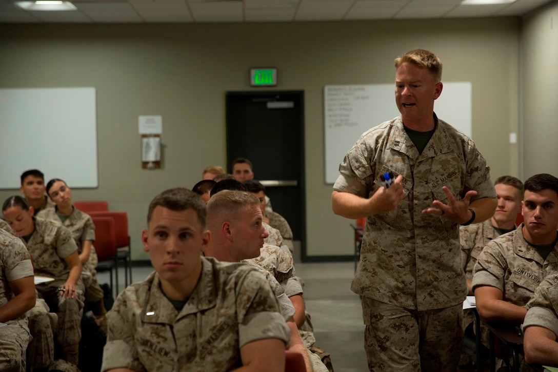 U.S. Marine Capt. Derek Donovan, the course coordinator and an operations officer with 1st Marine Logistics Group, instructs lieutenants at the 1st MLG Lieutenant Seminar, Camp Pendleton, Calif., Oct. 20, 2016. 1st MLG implemented the course earlier this year to build knowledge and networks between first and second lieutenants within the Group. The three day course is scheduled quarterly, so junior officers can become better leaders and mentors to the Marines under their charge. (U.S. Marine Corps photo by Sgt. Abbey Perria)