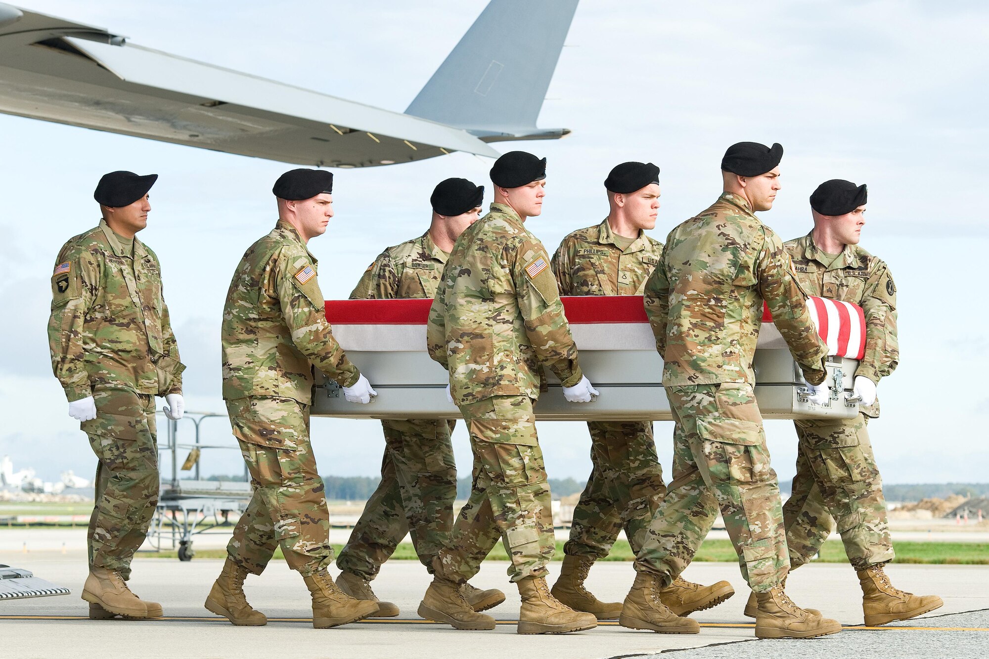 A U.S. Army carry team transfers the remains of Army Sgt. Douglas J. Riney, of Fairview, Ill., during a dignified transfer Oct. 21, 2016, at Dover Air Force Base, Del. Riney was assigned to Support Squadron, 3rd Cavalry Regiment, 3rd Cavalry Division, Fort Hood, Texas. (U.S. Air Force photo by Roland Balik)
