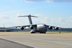 A U.S. Air Force C-17 Globemaster III brings about 20 members of the 689th Rapid Port Opening Element home from Haiti at Joint Base Langley-Eustis, Va., Oct. 20, 2016. The RPOEs are the U.S. Army’s main component for both the Seaport of Debarkation and Airport of Debarkation of the United States Transportation Command’s Joint Task Force-Port Openings mission. (U.S. Air Force photo by Airman 1st Class Tristan Biese)