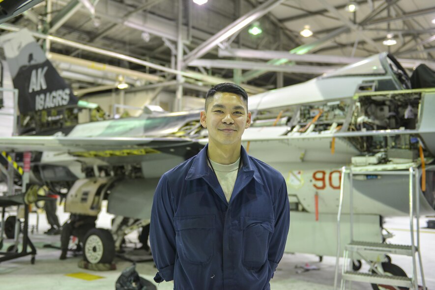 U.S. Air Force Senior Airman Danny Navo, a 354th Maintenance Squadron phase inspection section apprentice, takes a brief break Oct. 6, 2016, at Eielson Air Force Base, Alaska. Navo said the best part of his job is getting his hands dirty every day. (U.S. Air Force photo by Airman Isaac Johnson)