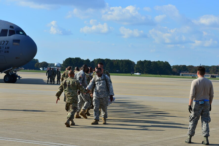 U.S. Army Soldiers from Fort Eustis welcome home members of the 689th Rapid Port Opening Element from Haiti at Joint Base Langley-Eustis, Va., Oct. 20, 2016. The unit provided disaster relief/humanitarian assistance efforts for two weeks, as a result of Hurricane Matthew. (U.S. Air Force photo by Airman 1st Class Tristan Biese)