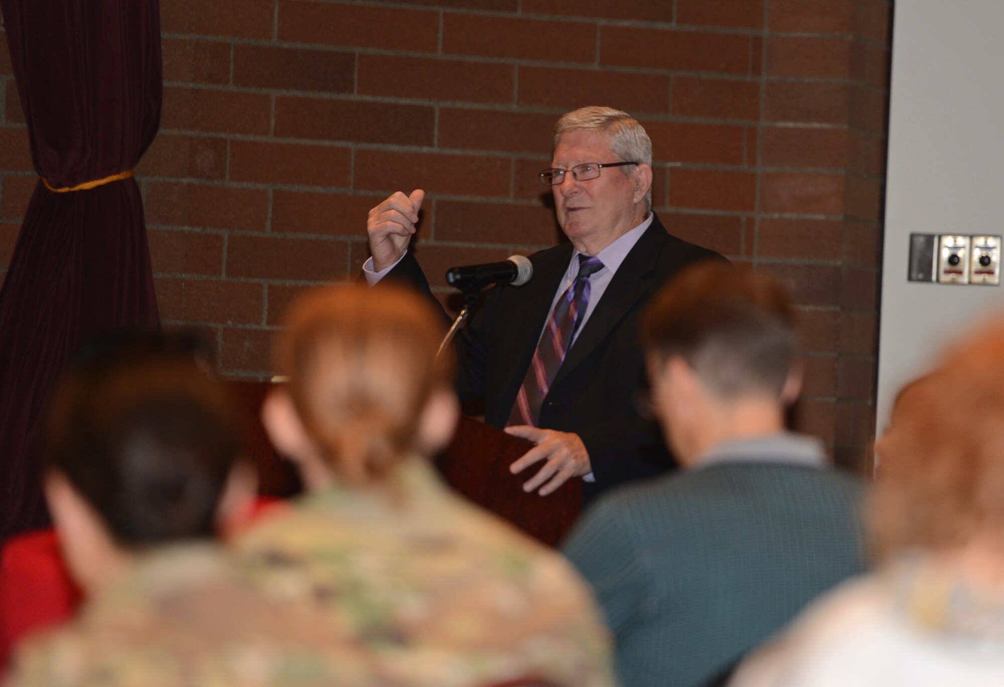 Lane Judson, father to a deceased victim of domestic violence Crystal Judson, speaks at a domestic violence awareness training session Oct. 21, 2016, at Joint Base Lewis-McChord, Wash. The training informed Service Members and members of the local community on the warning signs of domestic violence and how to help victims of domestic violence. (U.S. Air Force photo/Senior Airman Jacob Jimenez)  