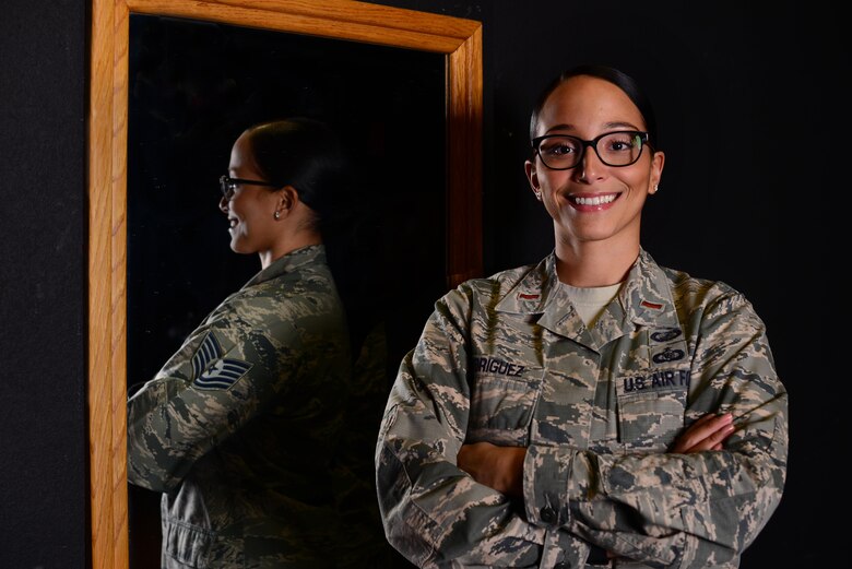 U.S. Air Force 2nd Lt. Caroline Rodriguez, 355th Comptroller Squadron financial services officer, poses for a portrait at Davis-Monthan Air Force Base, Ariz., Oct. 18, 2016. Rodriguez transitioned from enlisted member to officer after completing Air Force Officer Training School this past March. (U.S. Air Force photo illustration by Airman Nathan H. Barbour)