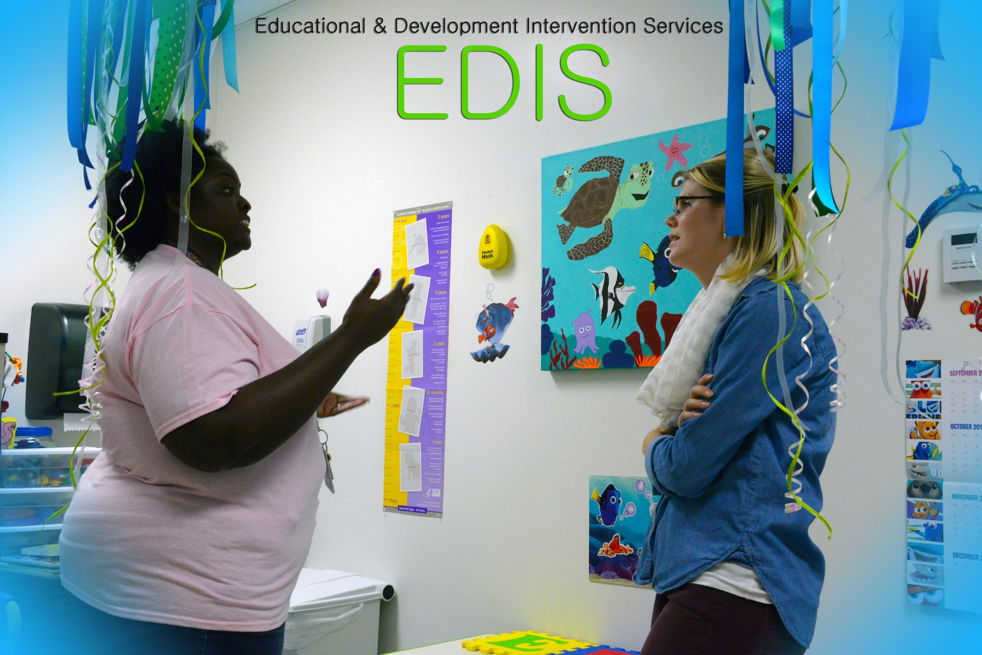 Neirissa Keeler speaks with a parent during an EDIS Program open house at the Maxwell AFB Clinic Oct. 21, 2016. EDIS stands for educational and developmental intervention services. Keeler, an early childhood special educator and EDIS element chief, offers developmental screening for any child with access to the Maxwell Clinic. Her element can offer advice, support and learning material for those who are missing some developmental milestones, and can also offer parents support on general topics ranging from potty training to helping with picky eating for any child. Keeler recommends all parents have their children screened before age 2. (U.S. Air Force photo by SrA William Blankenship)  