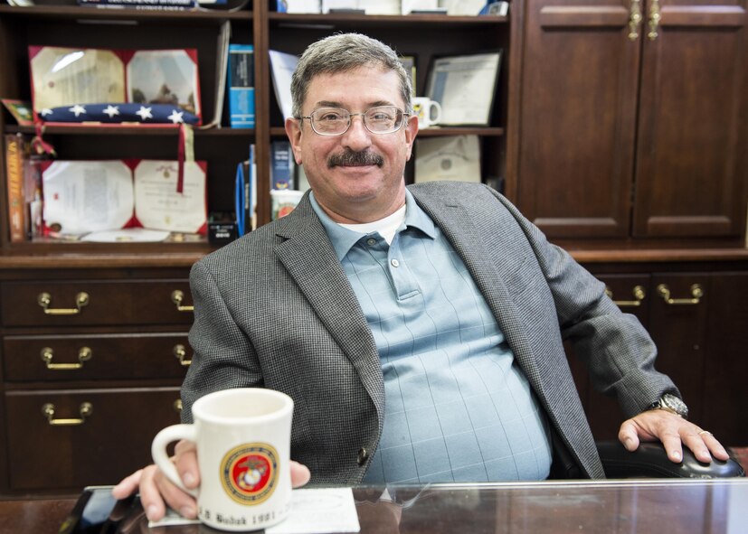 David Budak, the 49th Civil Engineer Squadron deputy base civil engineer poses for a photo in his office at Holloman Air Force Base, N.M., on Oct. 13. Budak, a 30-year Marine Corps veteran, was part of the initial response force that deployed after a suicide bomber attacked the Marine Headquarters barracks in Beirut, Lebanon in 1983. (U.S. Air Force photo by Senior Airman Emily Kenney)