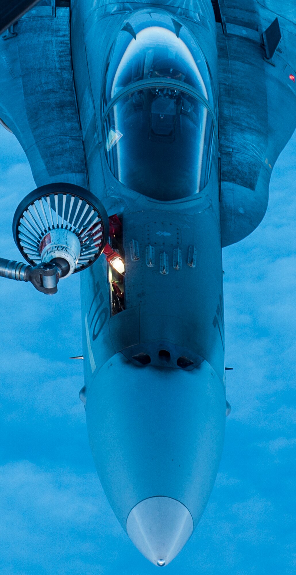 A U.S. Air Force KC-135 Stratotanker flown by the 912th Air Refueling Squadron from March Air Force Base, Calif., provides refueling capabilities to Royal Canadian Air Force CF-18s while both units participate in the Vigilant Shield 2017 Field Training Exercise Oct. 20, 2016, in the high arctic. This exercise provides crucial training opportunities for numerous military personnel with a variety of aircraft and assets from Canada and the United States to improve interoperability and to demonstrate North American Aerospace Defense Command’s ability to defend North America. (U.S. Air Force Photo by Tech. Sgt. Gregory Brook)